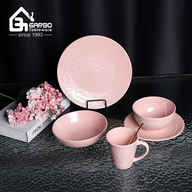 Elegant Dining Experience: Pink Glazed Stoneware Dinner Set with Embossed Designs from Garbo International