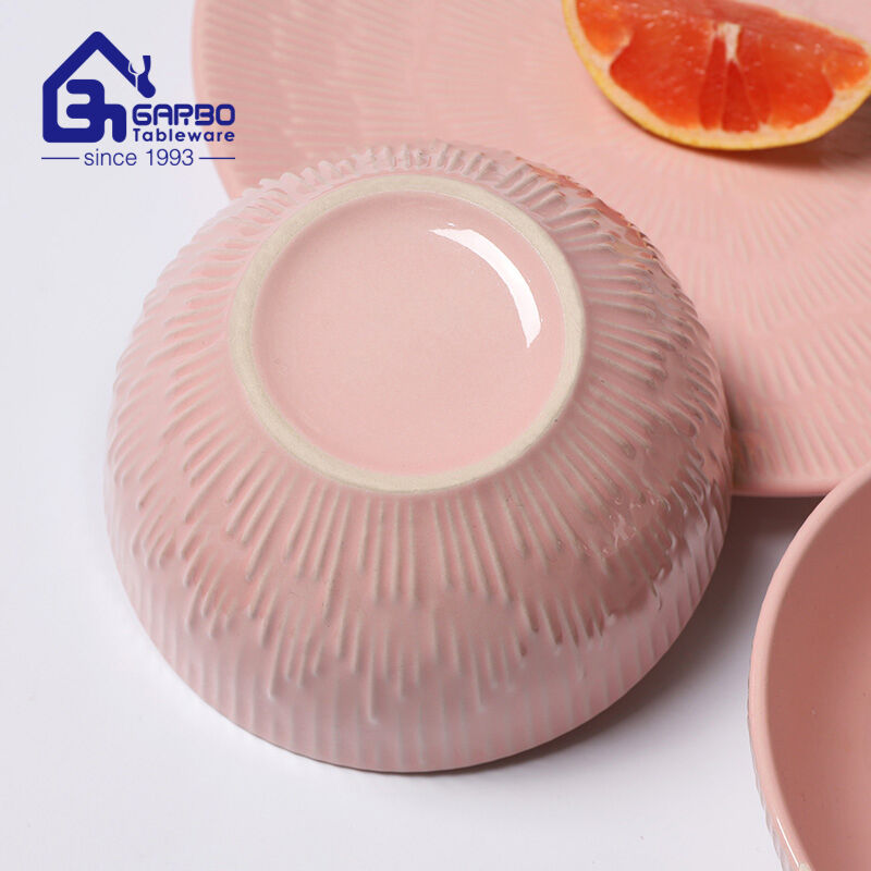 Elegant Dining Experience: Pink Glazed Stoneware Dinner Set with Embossed Designs from Garbo International