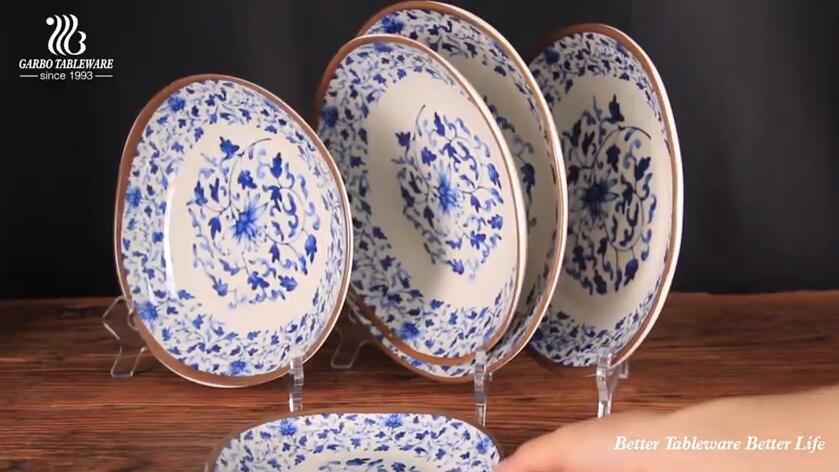 Round light plastic bowls and plates with traditional pattern