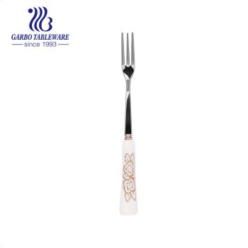 Wholesale silver mirror polished fruit forks with customized flower decals ceramic handle flatware for home used