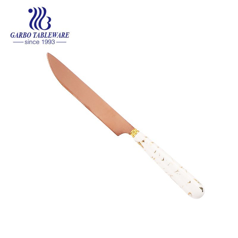 Ceramic handle butter spreader knife with round edge