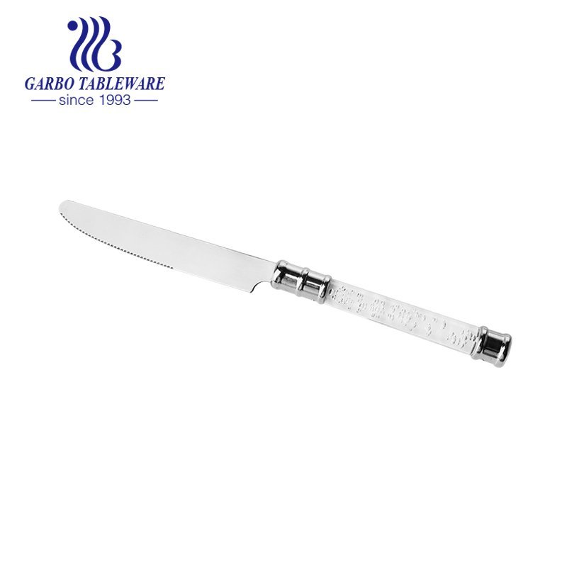 Comfortable to hold silver and gold dinner knife with white handle