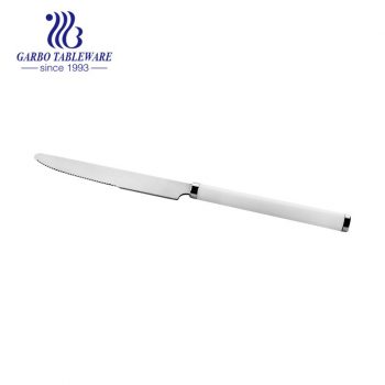 Comfortable to hold silver and gold dinner knife with white handle