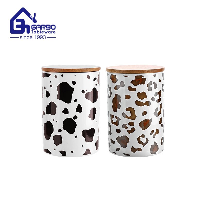 Factory Wholesale 28.6oz cylinder-shaped printing ceramic canister creative porcelain storage jar containers with bamboo lid